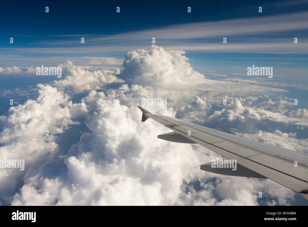 View from a plane towards a distinctive cloud formation Stock Photo