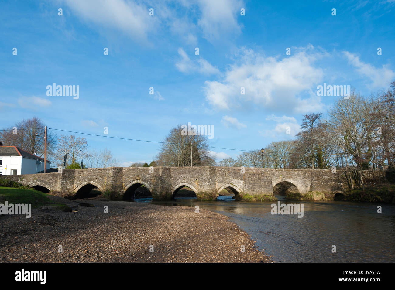 The ancient bridge at Lostwithiel on the River Fowey, Cornwall. The exact date of construction is unknown but is dated to 14th C Stock Photo