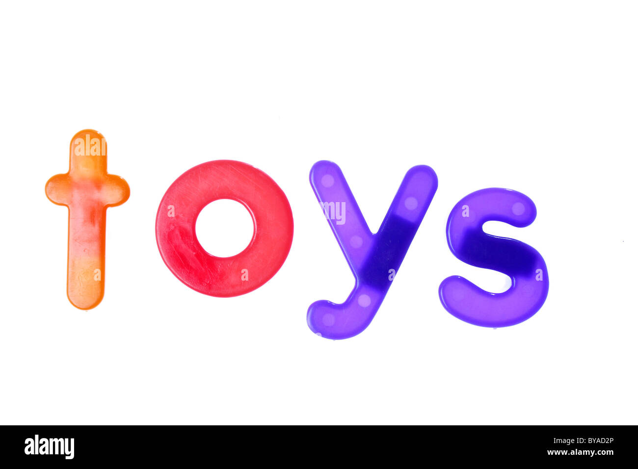 the word toys written on white using children's toy letters Stock Photo
