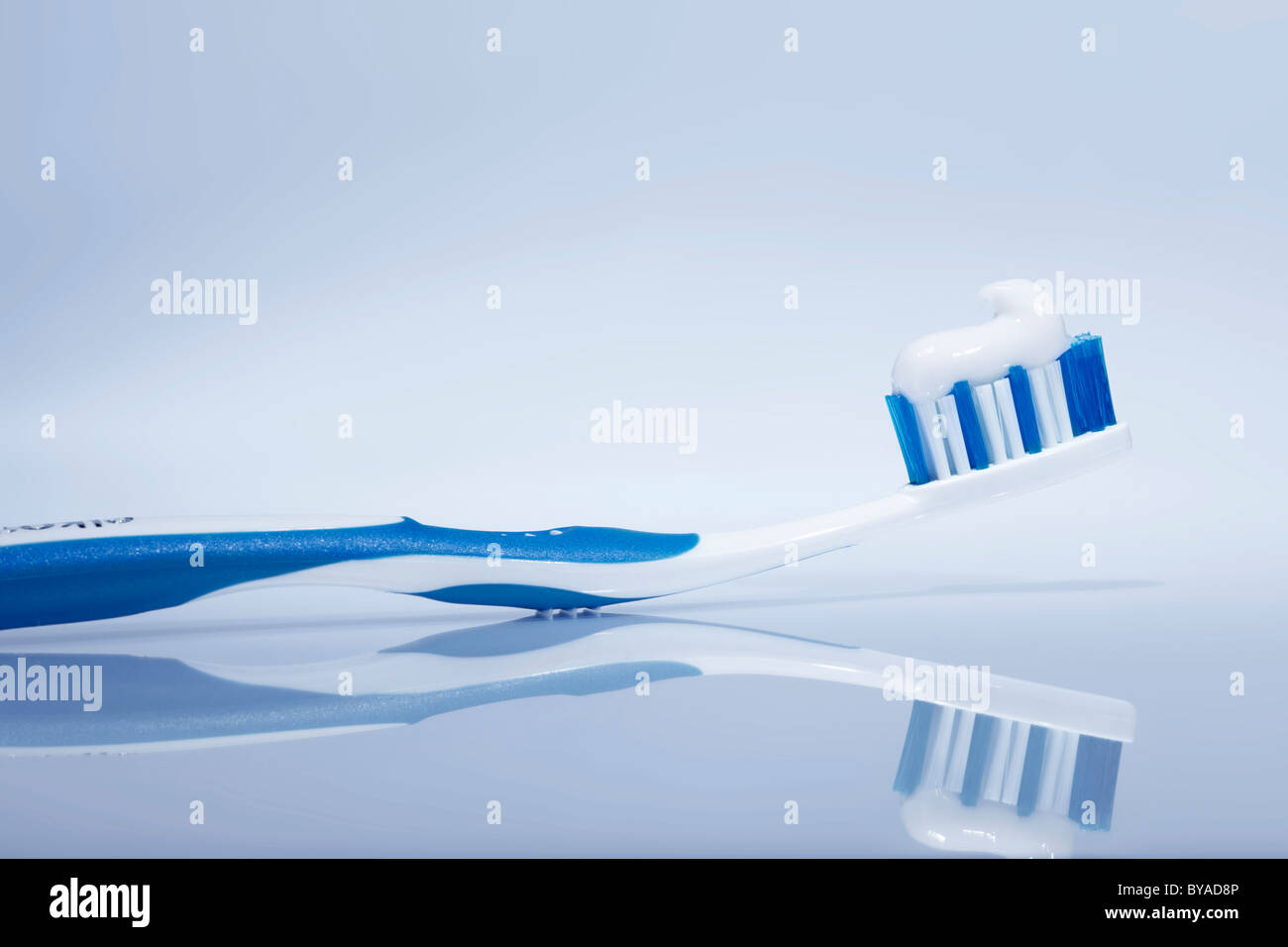 Blue white toothbrush toothpaste hires stock photography and images Alamy