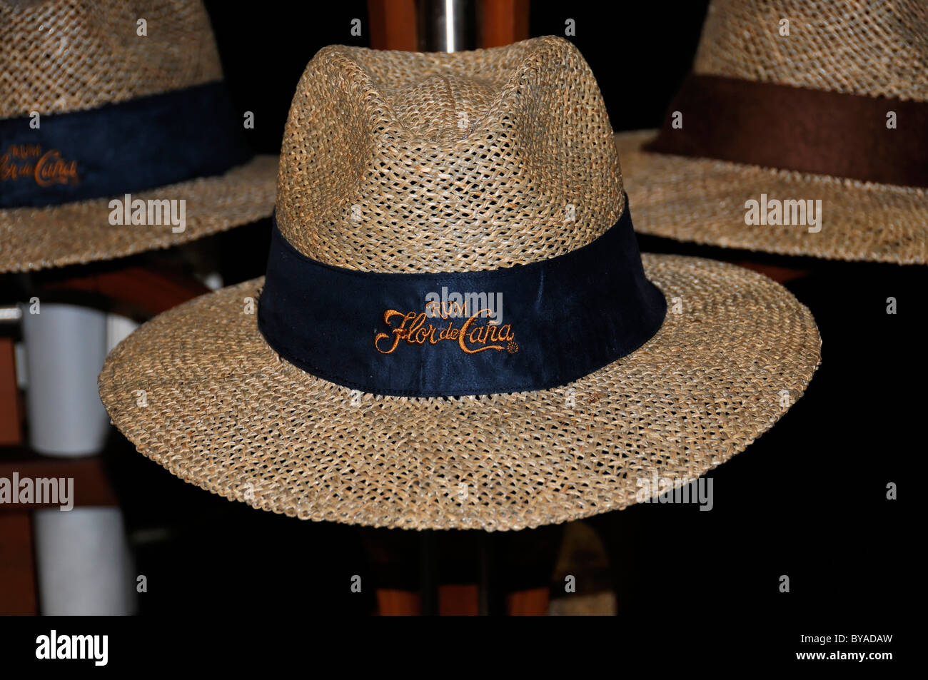 Flor de Cana, man's hat, airport shop, Augusto C. Sandino Airport, Managua, Nicaragua, Central America Stock Photo