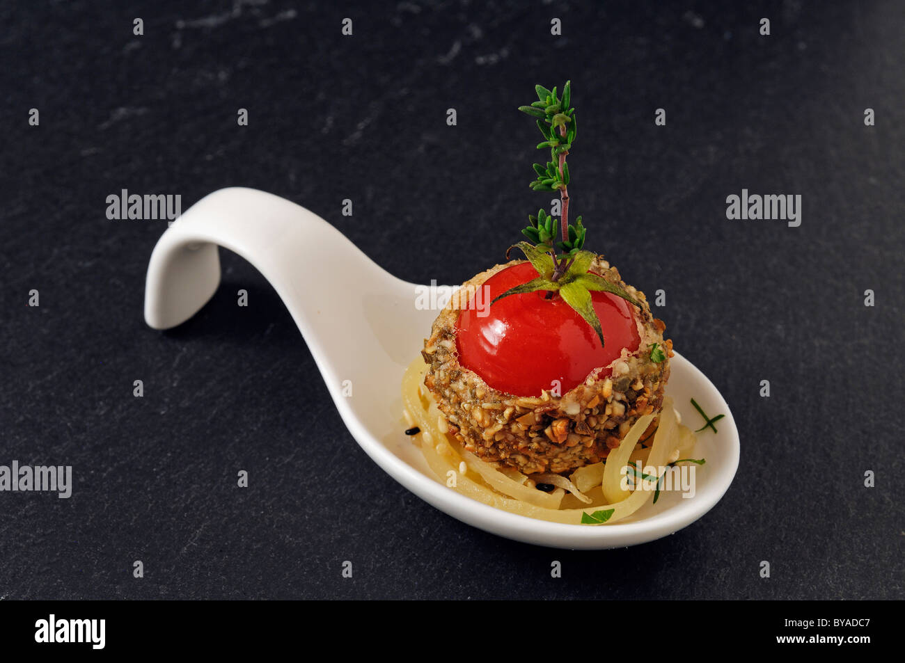 Foie Gras with stuffed cherry tomatoes and green papaya salad, food, haute cuisine Stock Photo