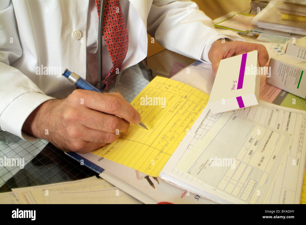 Doctor prescribing a drug Stock Photo Alamy