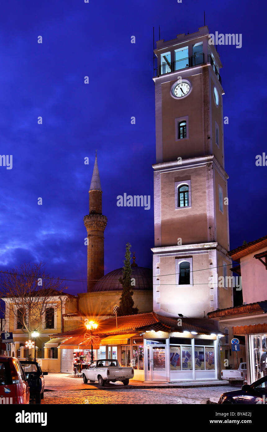 Greece, Komotini, Thrace. The clocktower and the Yeni Camii ('New Mosque'), 2 of the 'trademarks' of Komotini town at night Stock Photo