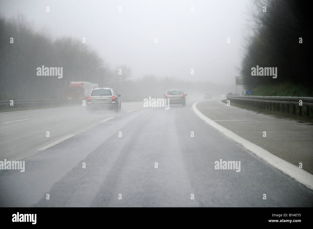 Rain, fog, bad weather, poor visibility, traffic, A 45 motorway, Sauerland area, North Rhine-Westphalia, Germany, Europe Stock Photo