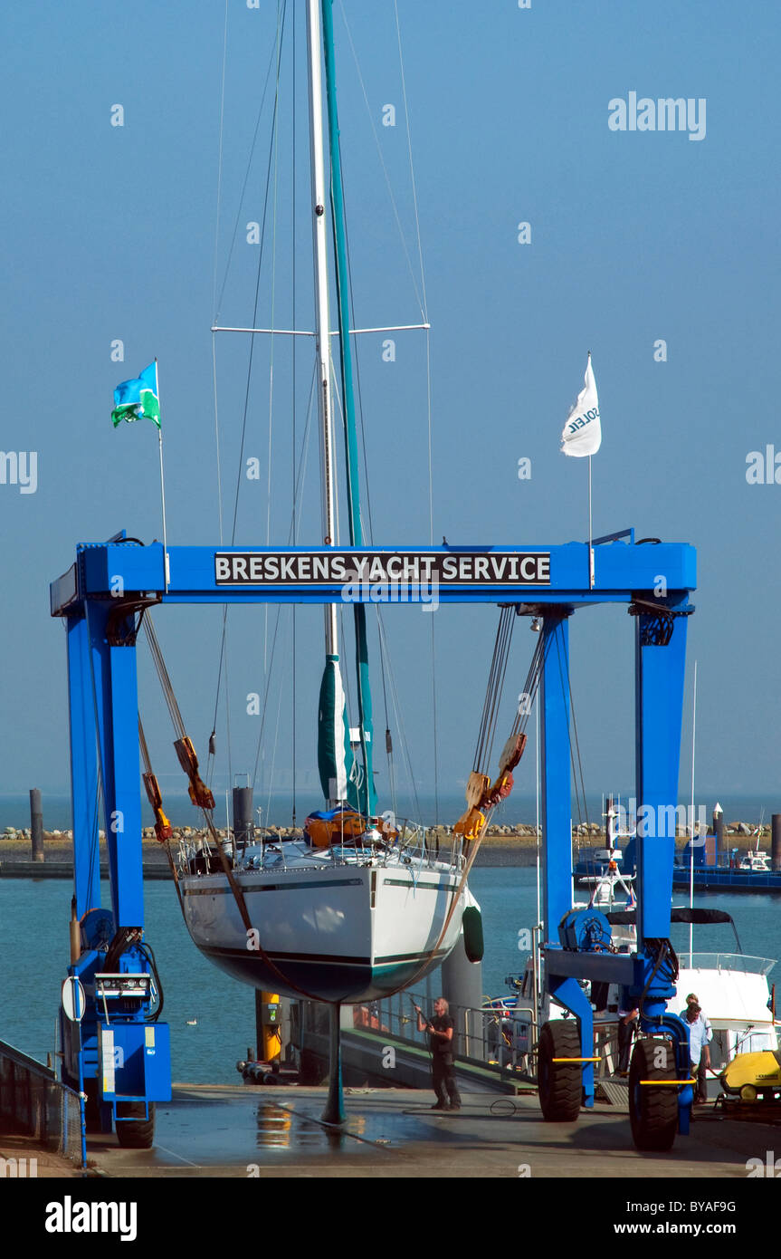 Sailing boat in drydock at Breskens harbour, The Netherlands Stock Photo