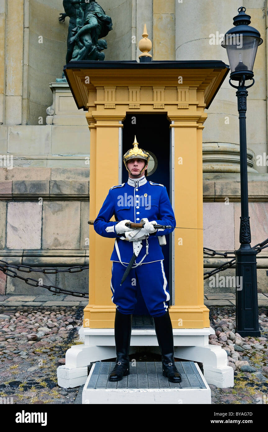 A member of the Royal Palace Guard in dress uniform on duty outside the palace, Stockholm Stock Photo