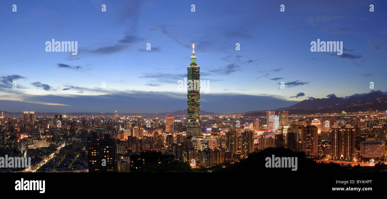 Panoramic city skyline in night with famous 101 skyscraper and buildings in Taipei, Taiwan. Stock Photo