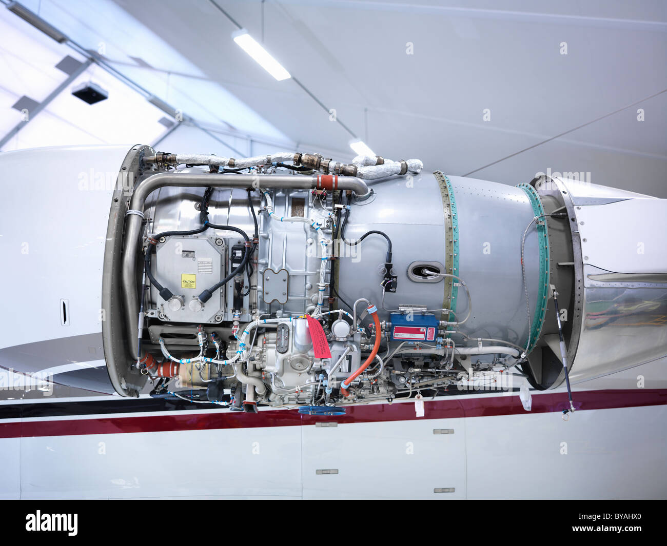 Jet engine in an aircraft hangar Stock Photo