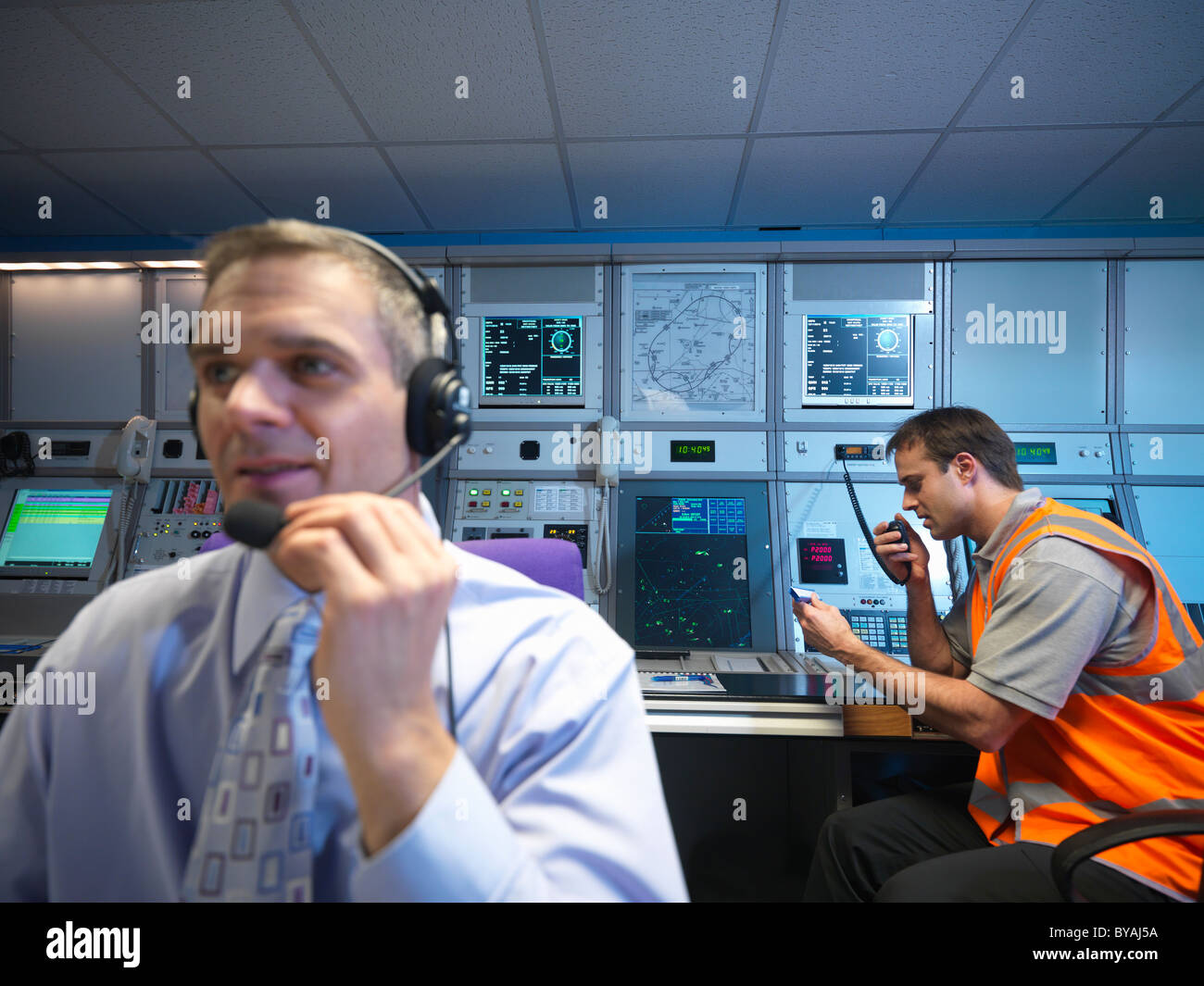 Air traffic controllers in radar room Stock Photo