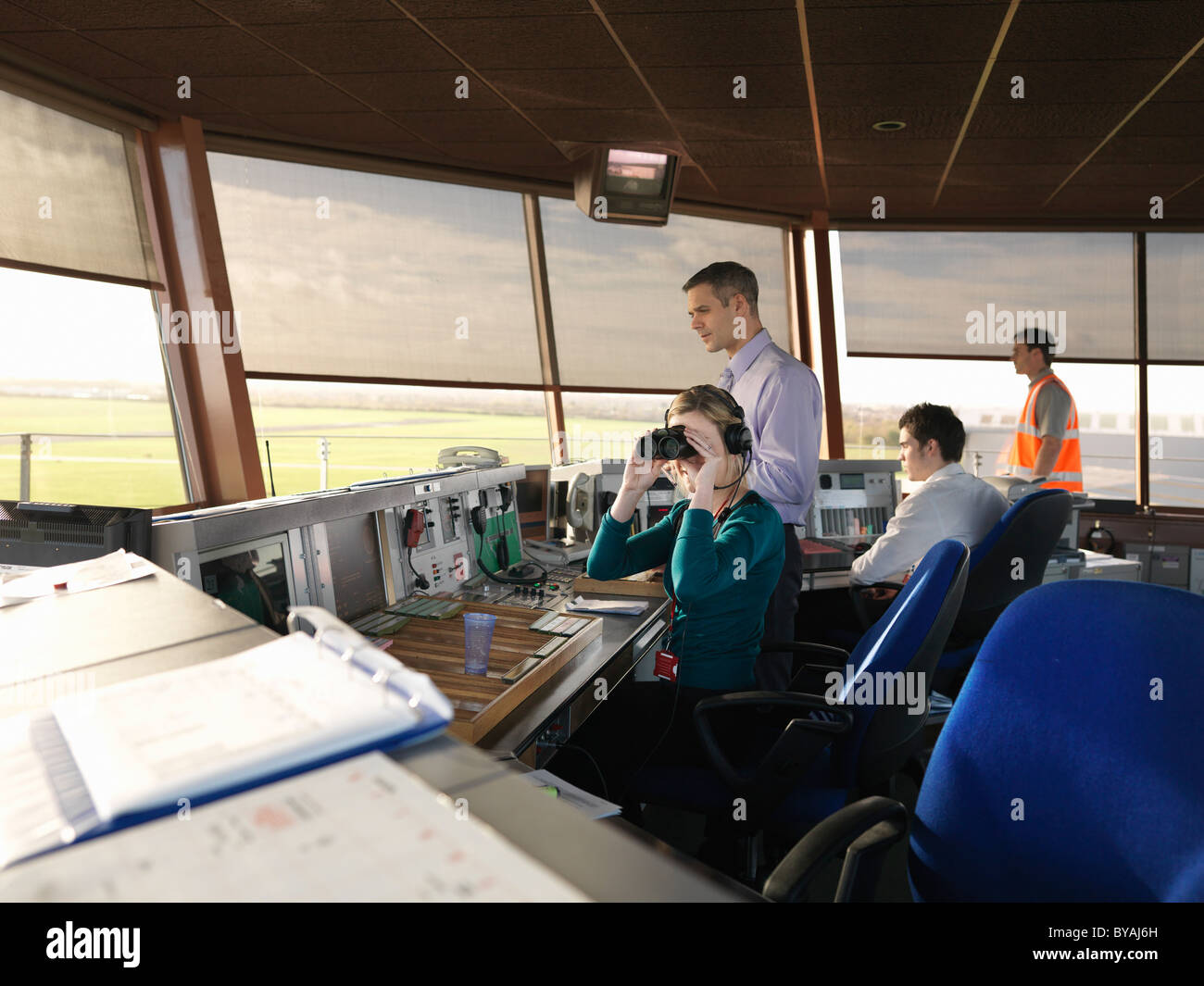 Air traffic controllers in tower Stock Photo