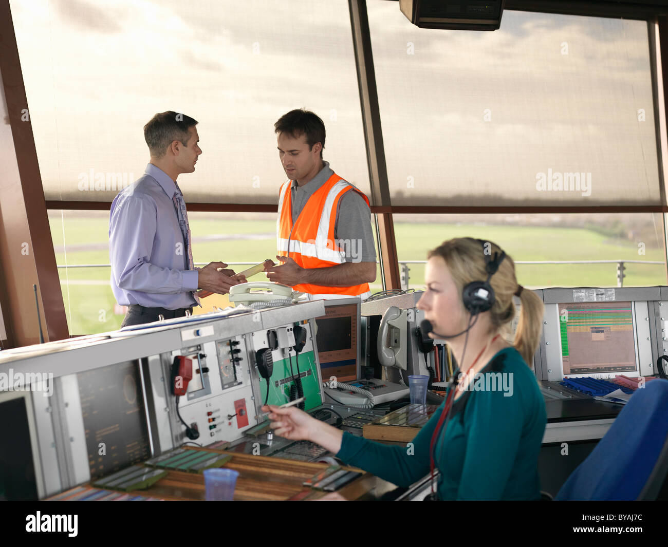 Air traffic controllers in tower Stock Photo