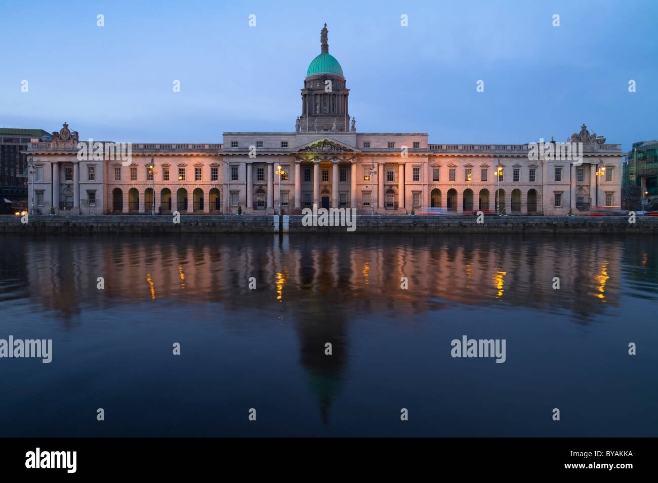The Custom House in Dublin at night, observed across the river Liffey