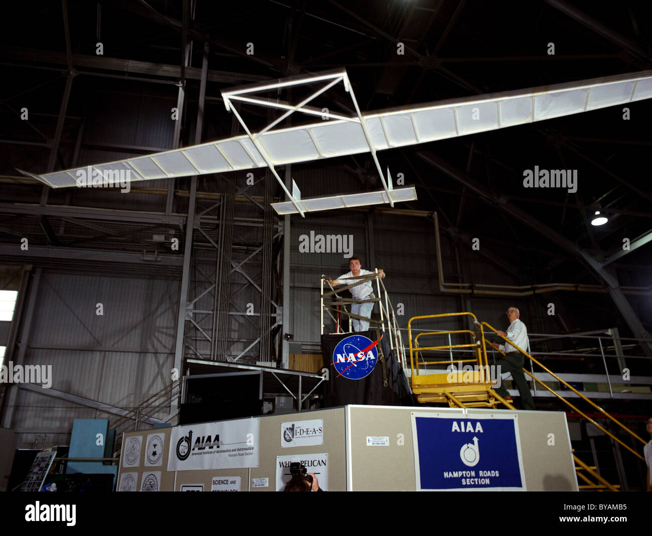 World record breaking paper airplane inside a Langley hangar. Stock Photo