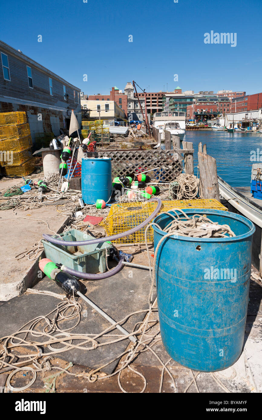 Lobster traps and fishing gear strewn around the Portland Pier in the