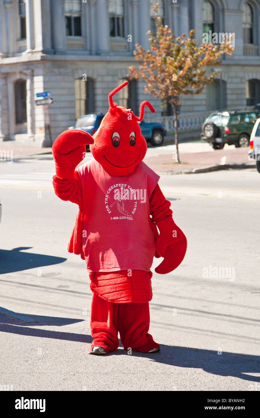 Person in bright red lobster costume advertises for a restaurant in the Old Port district of Portland, Maine Stock Photo