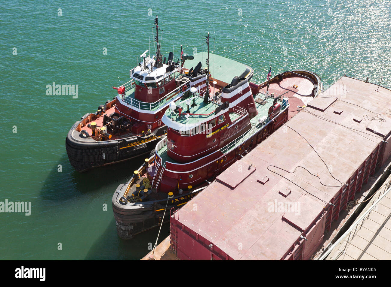 Tugboats Fournier Girls and Andrew McAllister docked in Casco Bay in  Portland, Maine Stock Photo - Alamy