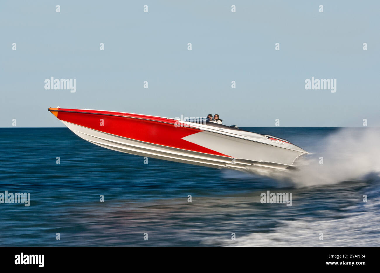 Powerboat racing at high speed Stock Photo - Alamy