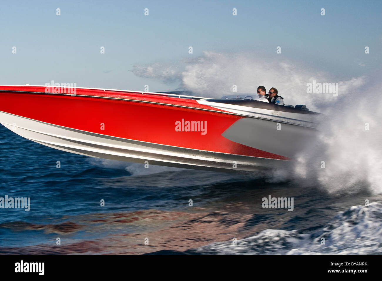 Powerboat racing at high speed Stock Photo - Alamy