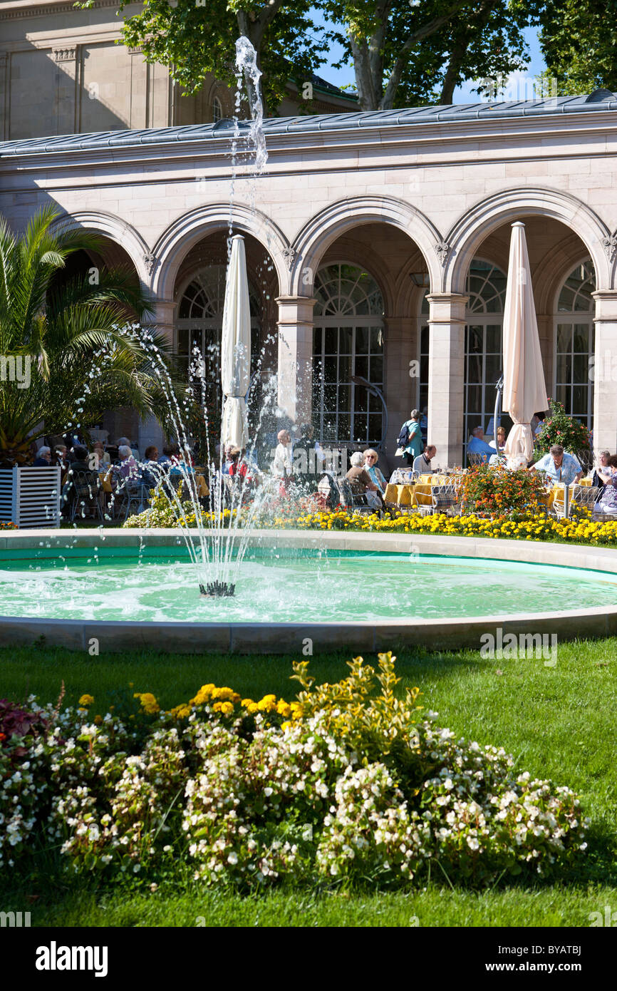 Pensioners in the Kurgarten Cafe, a cafe in a spa garden of the Kurhaus