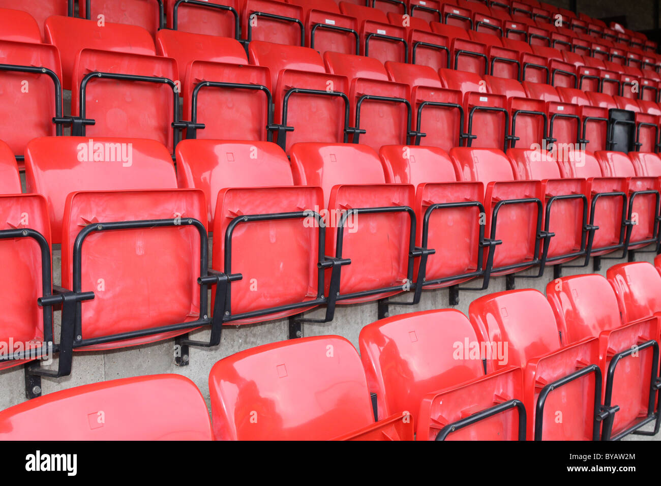 folded seats at a football stadium or ground Stock Photo