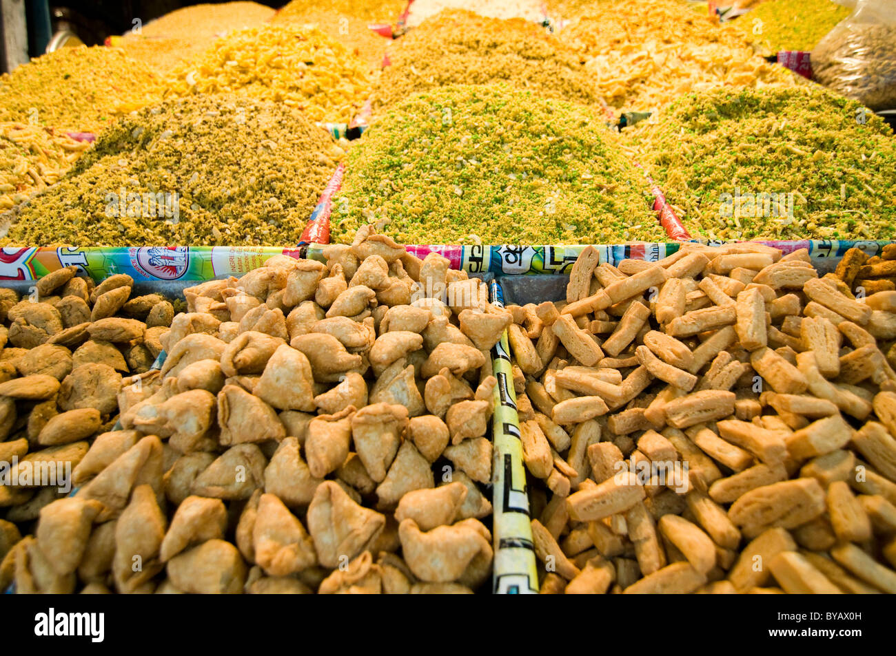 Indian salty snacks are sold throughout India Stock Photo Alamy