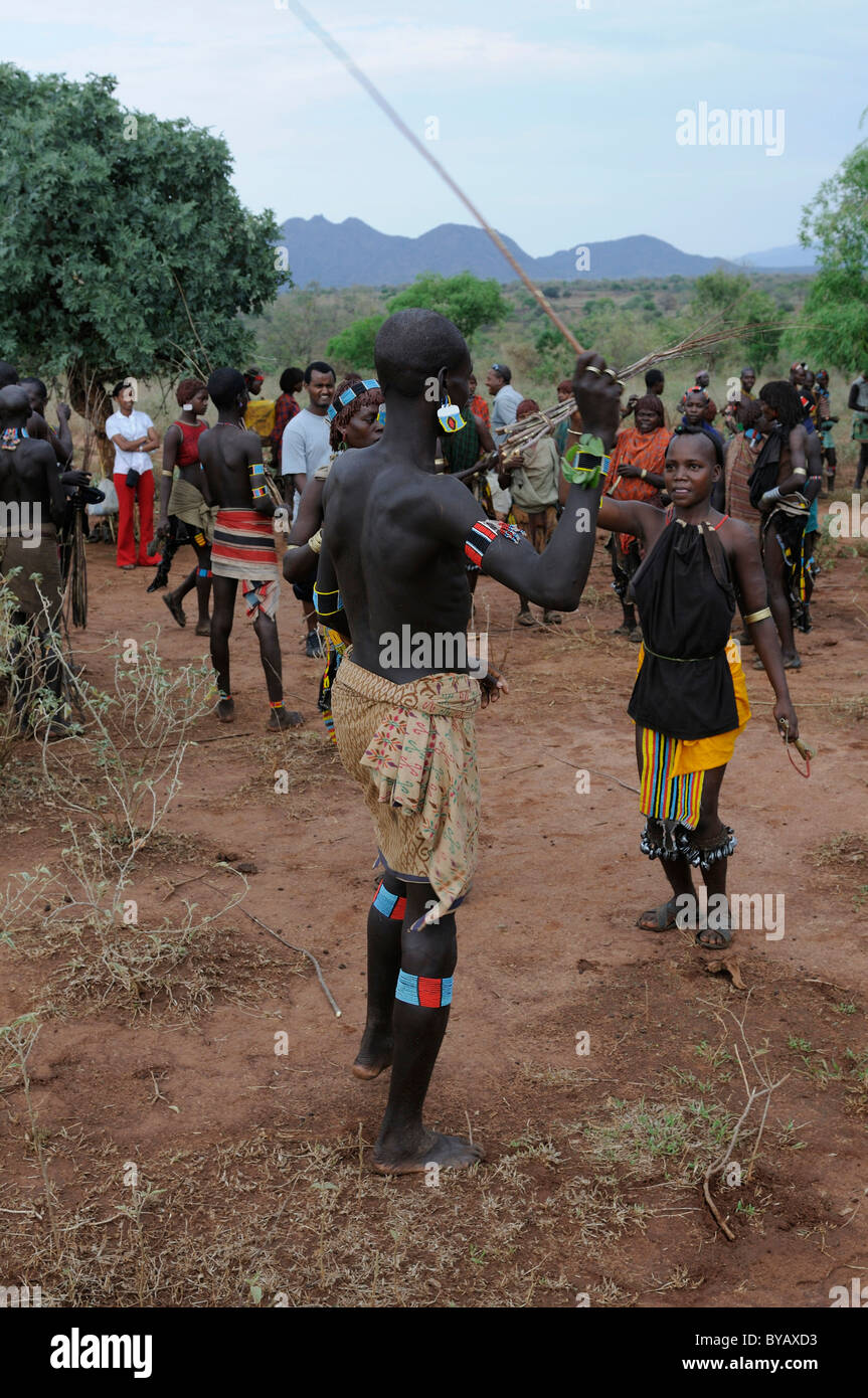 Woman from the Hamar tribe being flogged in the initiation ritual 