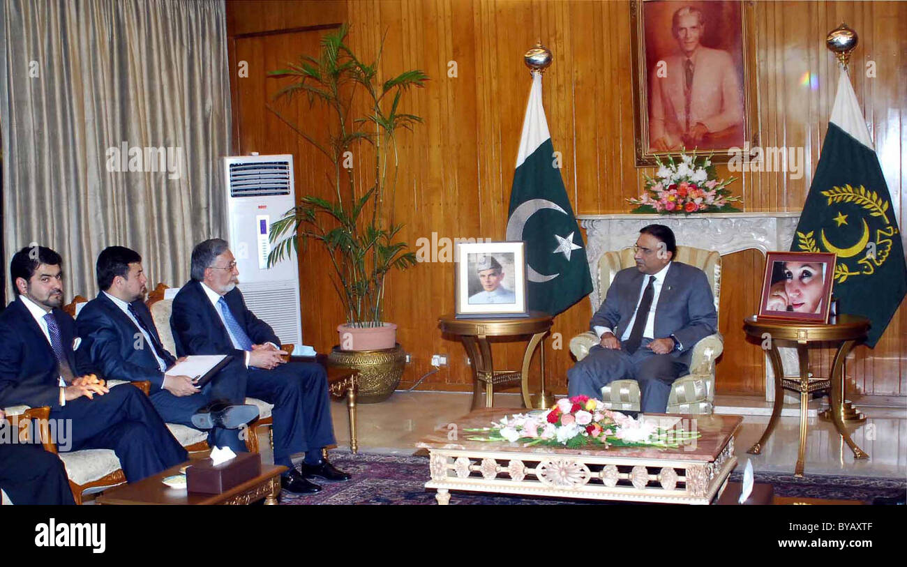President, Asif Ali Zardari in meeting with Afghanistan Foreign Minister, Dr.Zalmai Rasool at Aiwan-e-Sadr in Islamabad Stock Photo