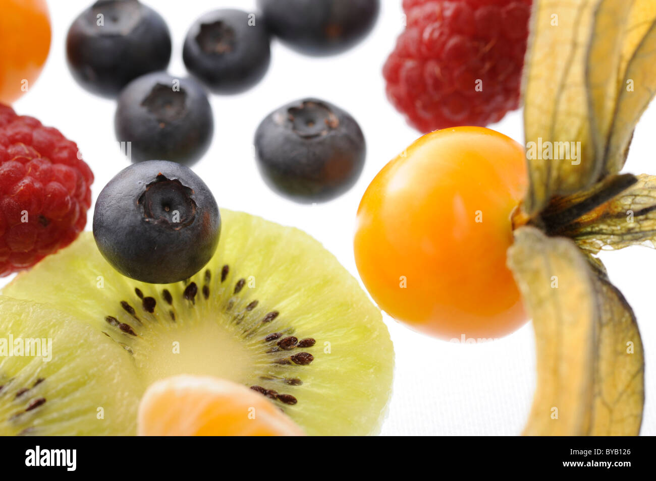 Berries, fruit, blueberries, rasberries, kiwifruit, Cape gooseberry (Physalis) Stock Photo