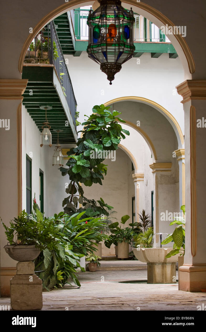 A typical patio area found behind the walls of house in Havana Cuba. Stock Photo