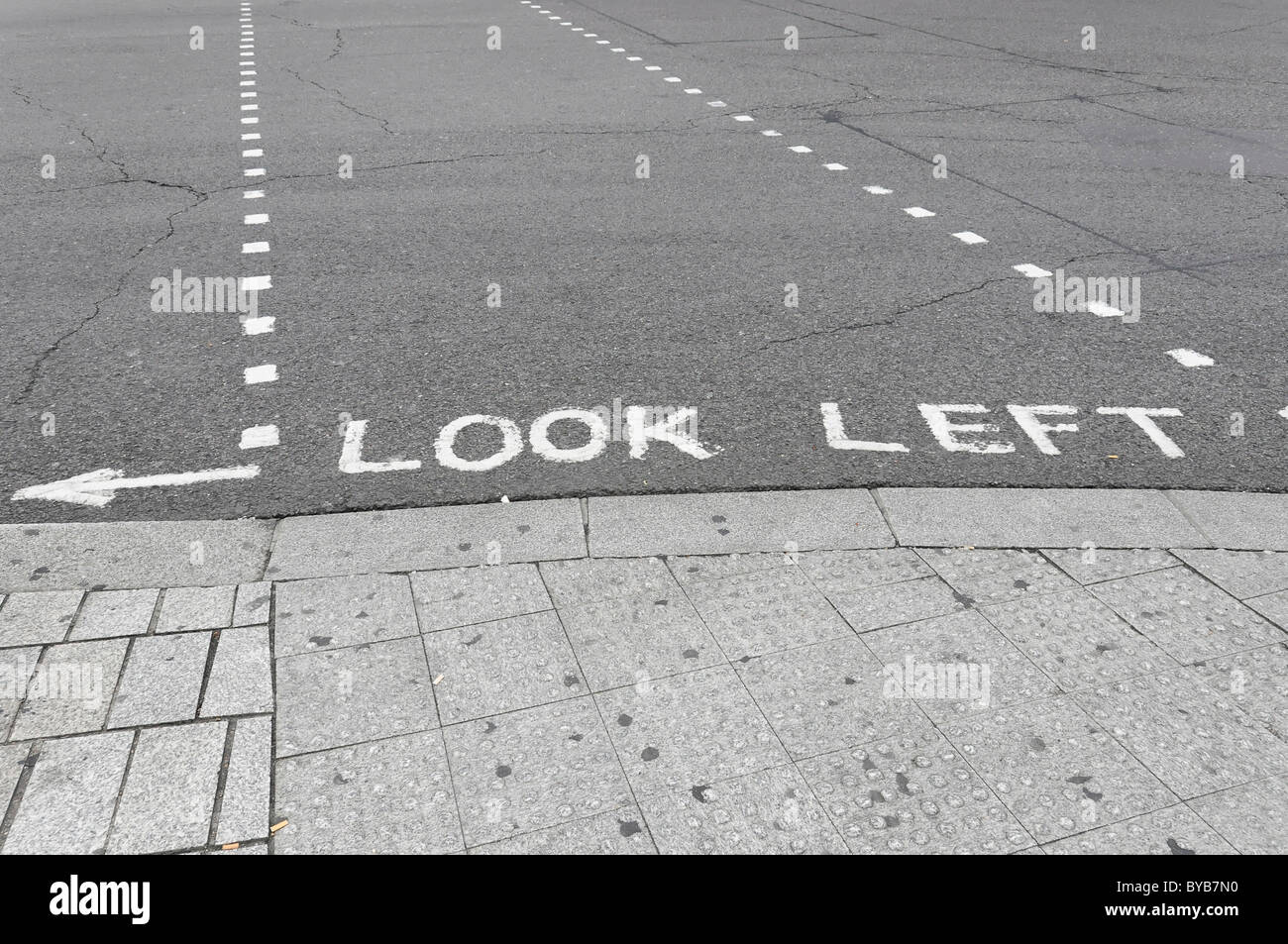 Look left, road markings for pedestrians, London, England, United