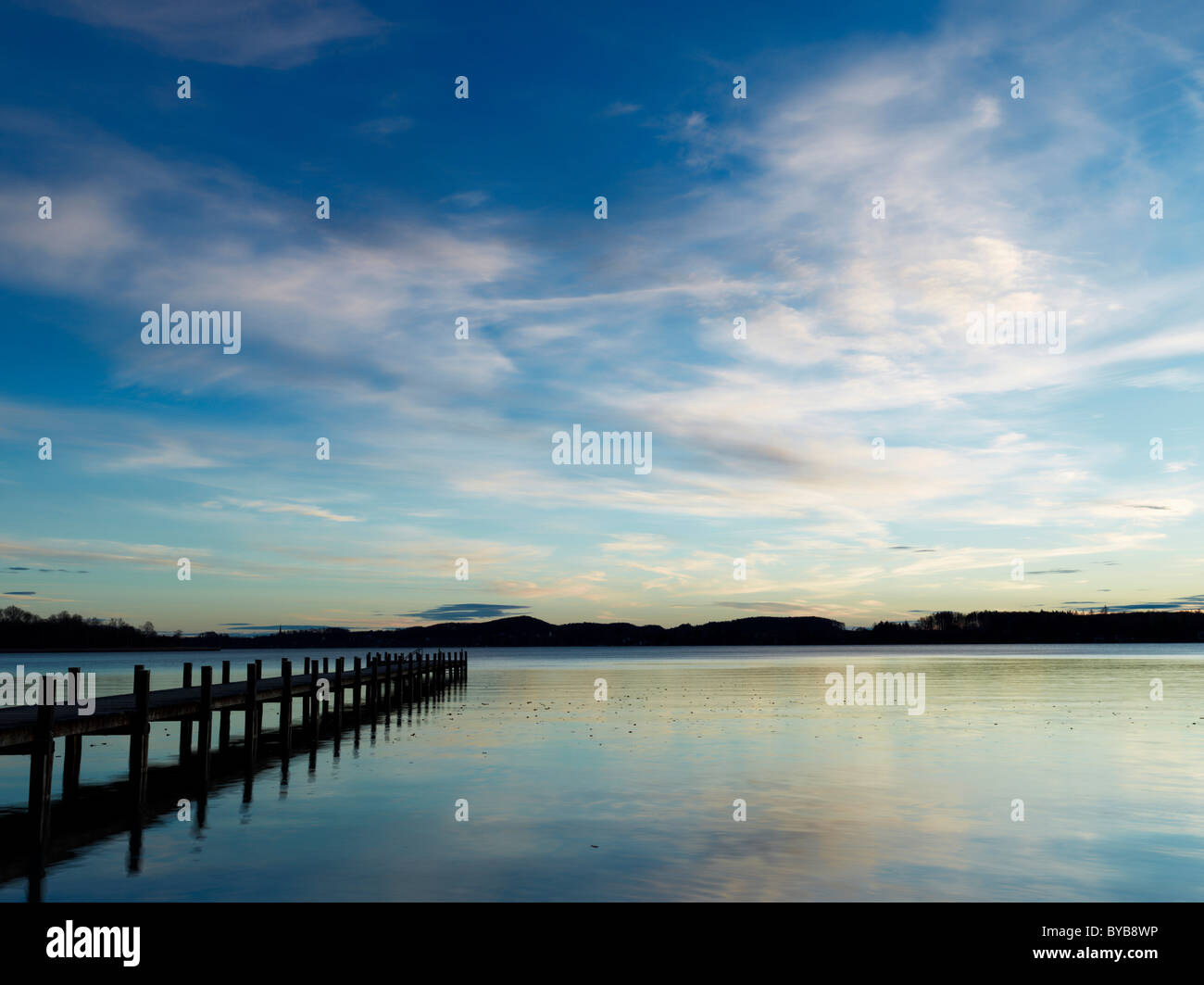 Sunrise at a jetty on lake Woerthsee, Bavaria, Germany, Europe Stock Photo