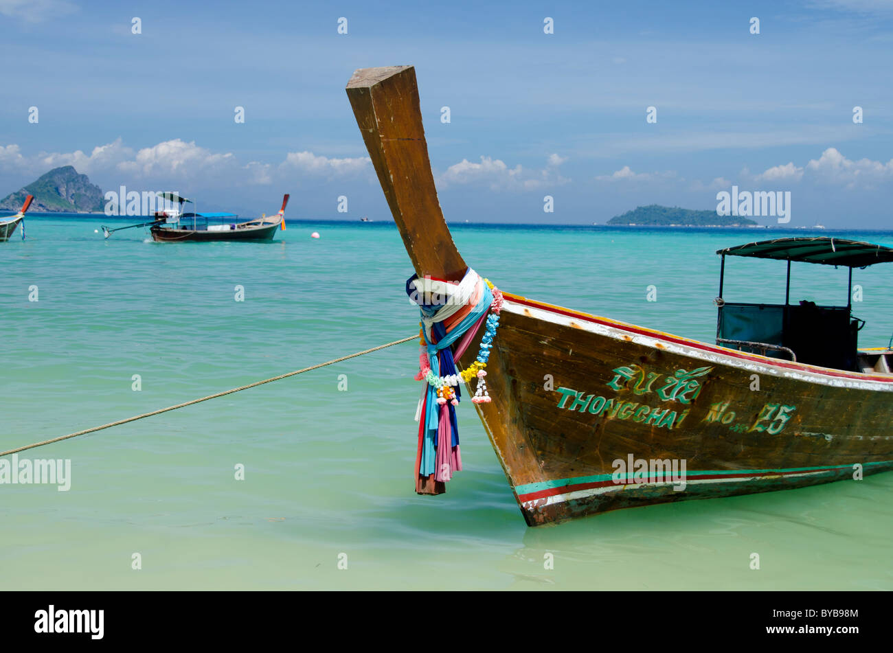 Thai Long Tail Fishing Boat With Motor. Stock Photo, Picture and Royalty  Free Image. Image 50084707.