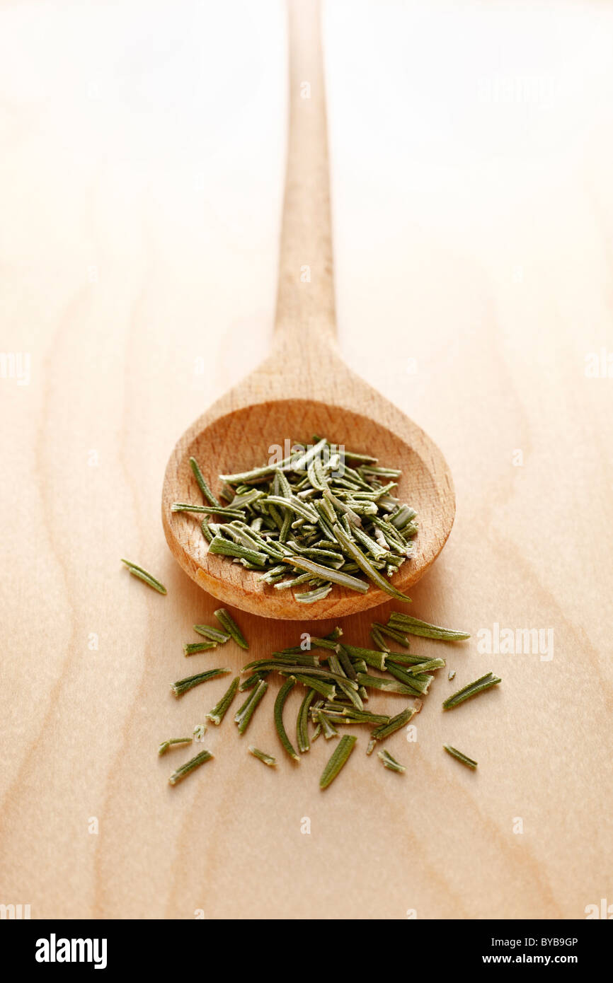 wooden spoon with rosemary Stock Photo