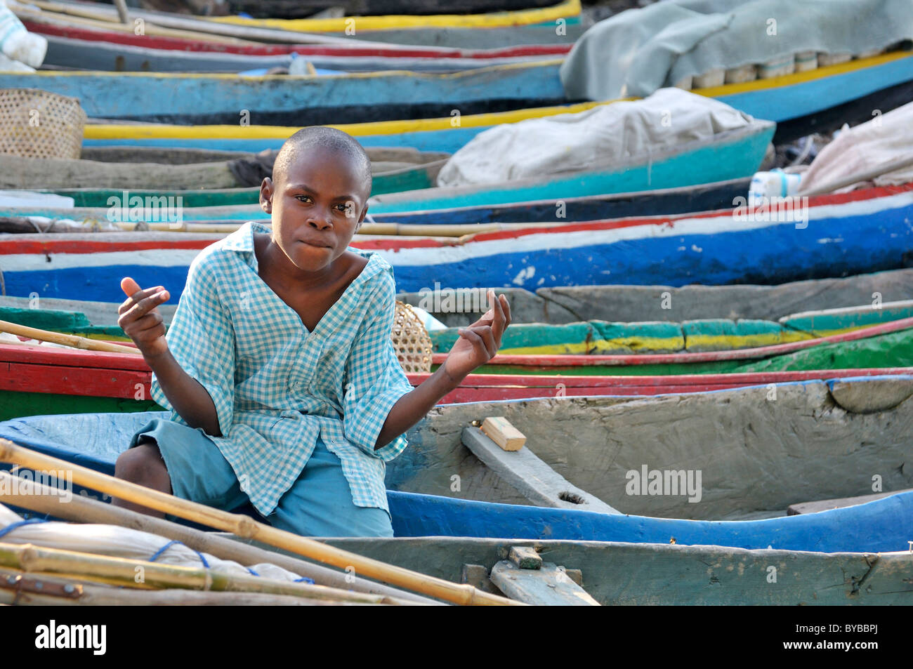 Boy fishing boat hi-res stock photography and images - Alamy