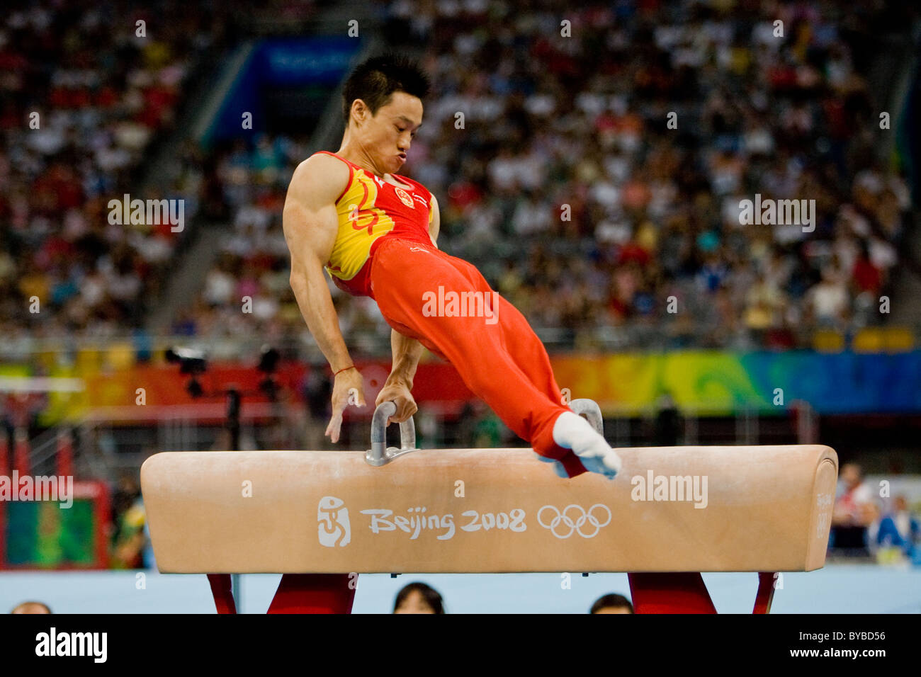Yang Wei (CHN) preforming on the pommel horse during the men's team finals at the 2008 Olympic Summer Games, Beijing, China Stock Photo