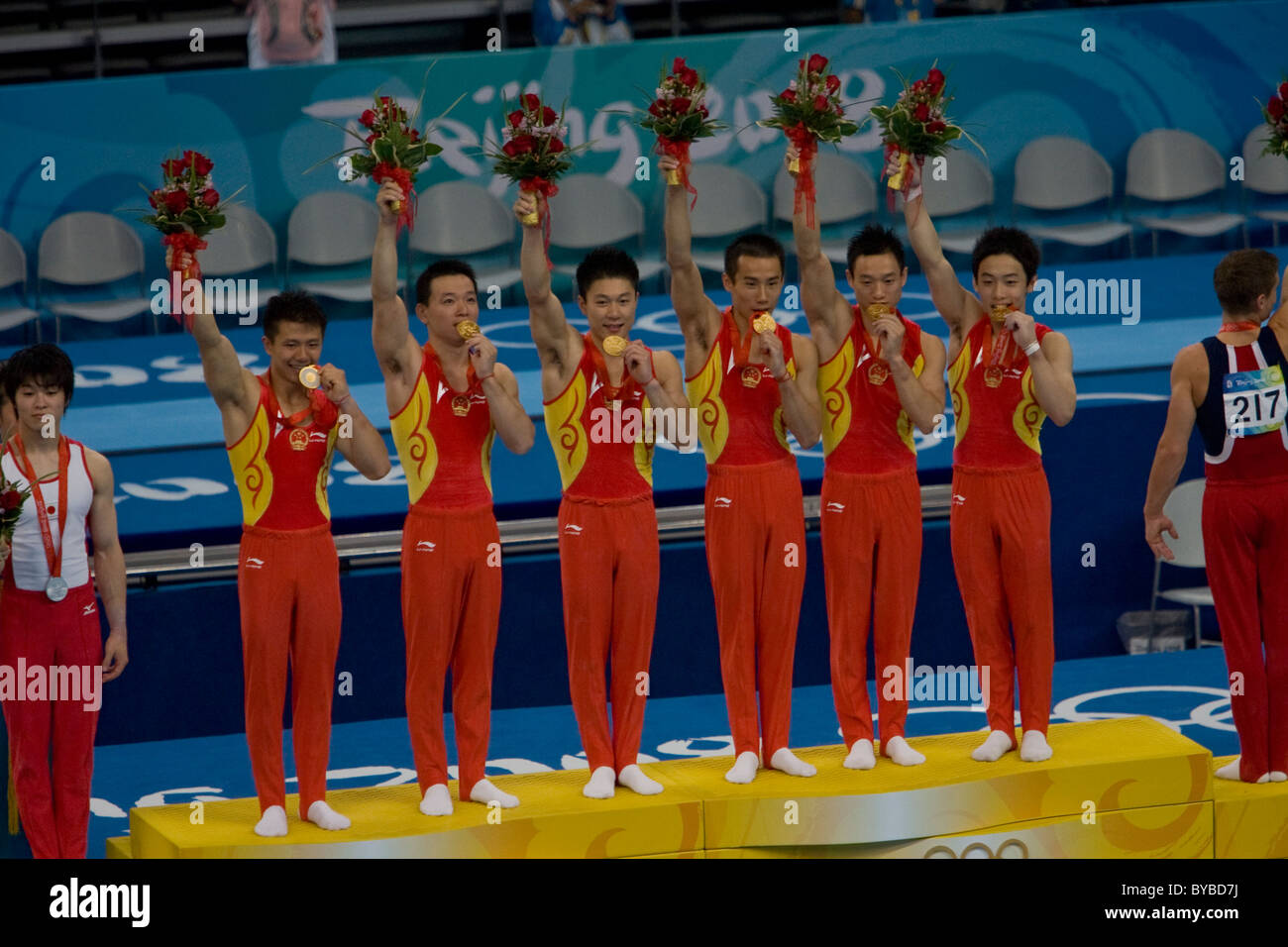 Gold medal winning Chinese men's gymnastic team on the podium at the 2008 Olympic Summer Games, Beijing, China Stock Photo