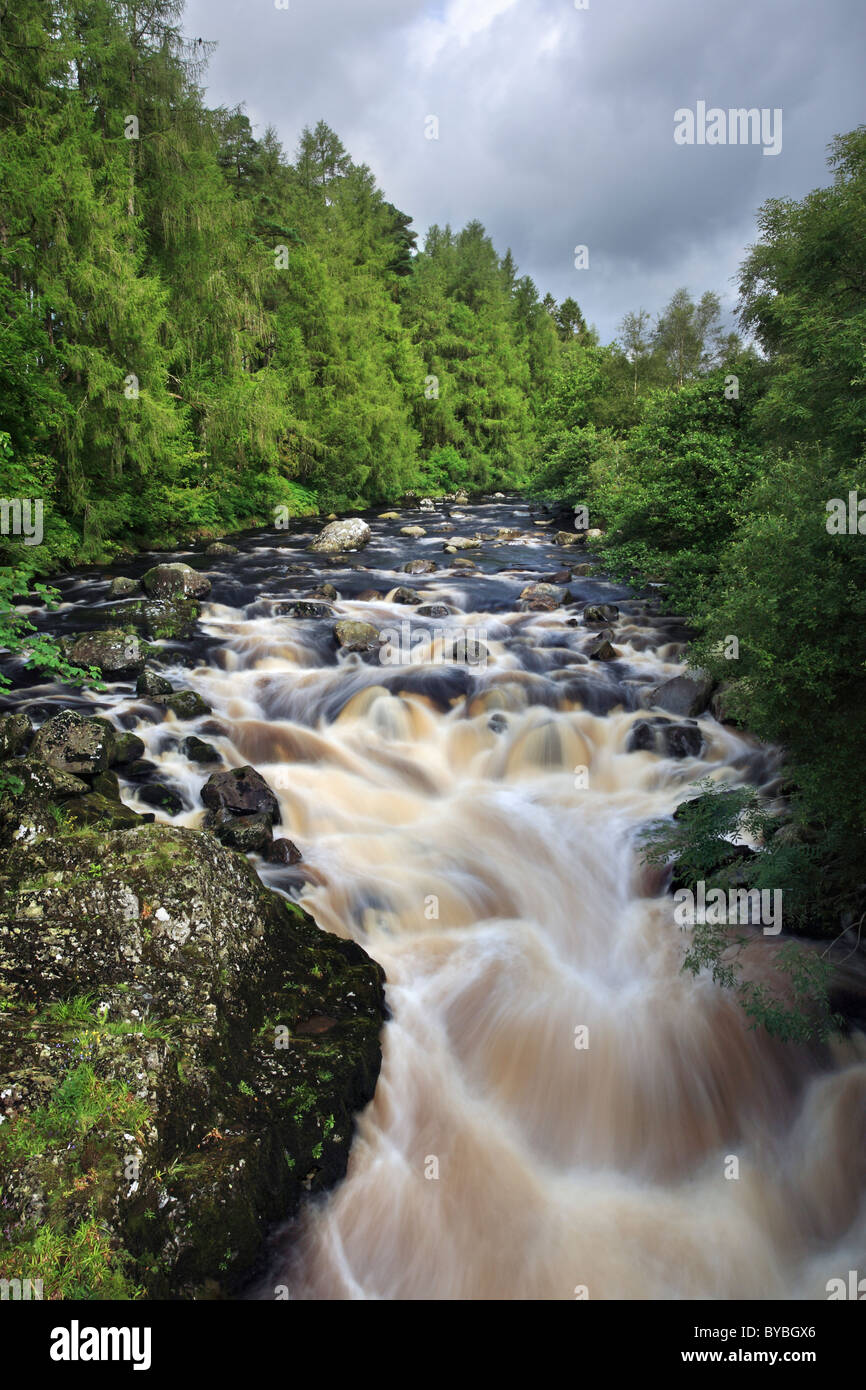 The waterfall captured from the road bridge near the Glen Trool vistor centre in the Galloway Forest Park Stock Photo