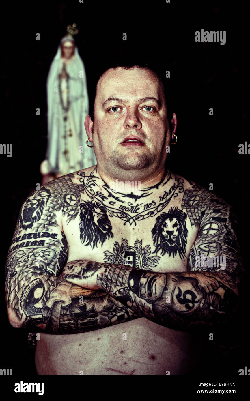 Portuguese football hooligan with tattoos with the Virgin of Fátima