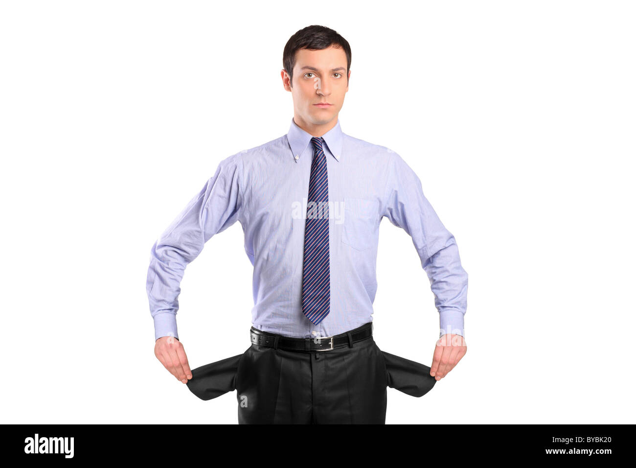 A broke businessman turns out his empty pockets Stock Photo Alamy
