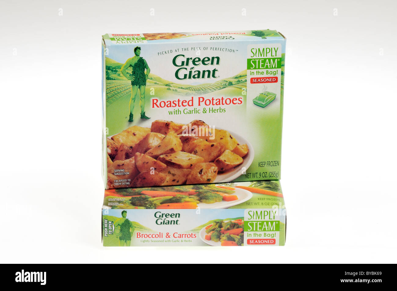 Packages of Green Giant frozen vegetables roasted potatoes  and broccoli and carrots on white background, cutout. Stock Photo