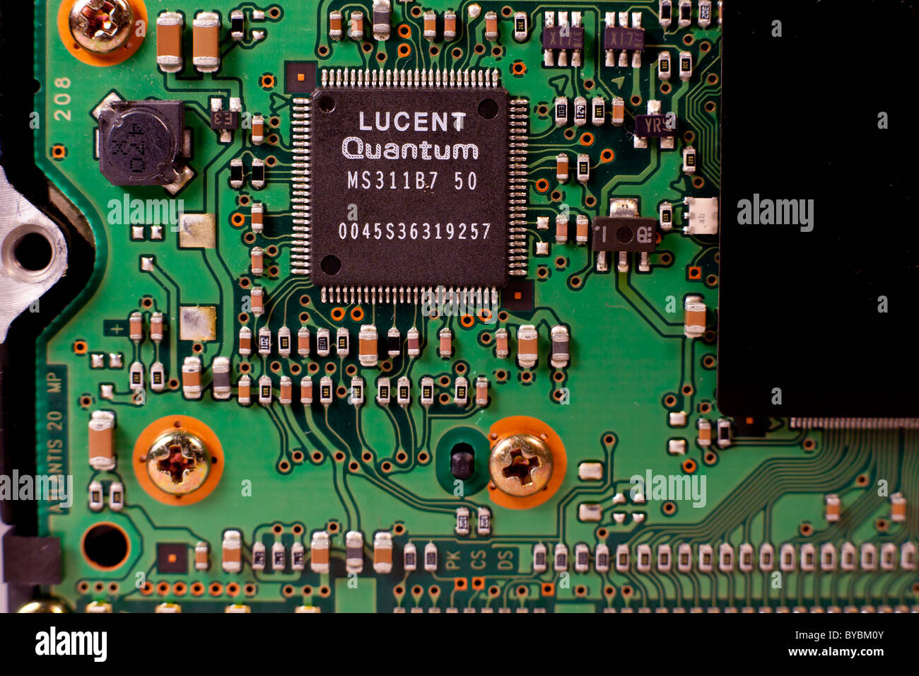 A UDMA hard drive circuit board with a Lucent microchip Stock Photo - Alamy