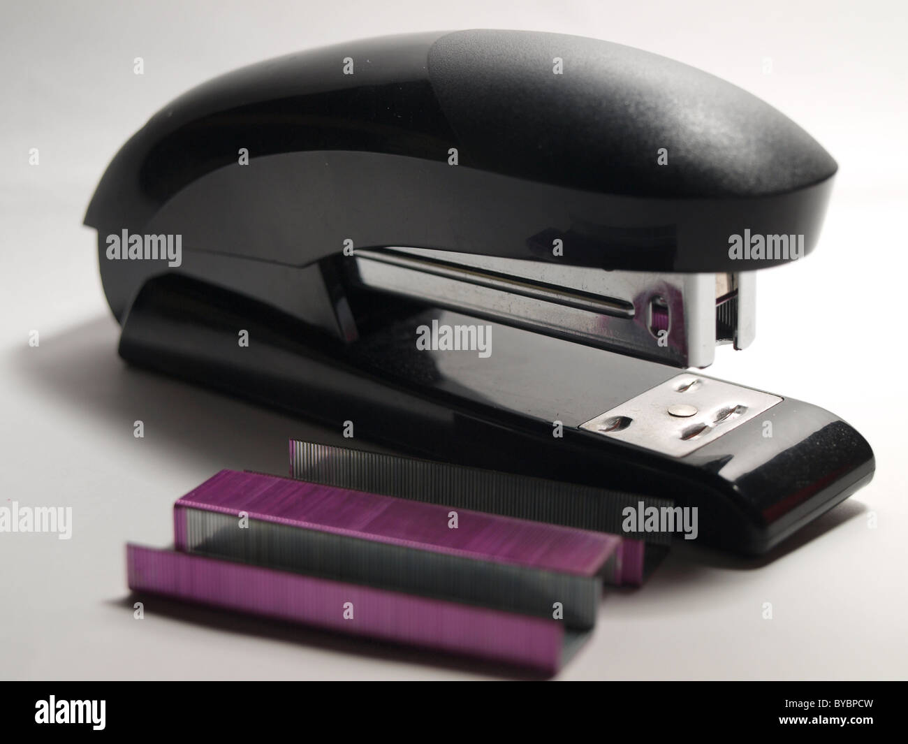 Black Stapler and Staples isolated on a white background Stock Photo
