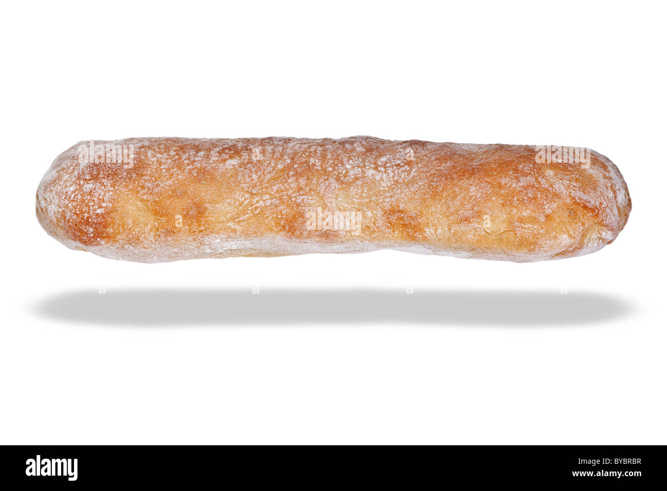 Photo of a Ciabatta loaf of bread, isolated on a white background with floating shadow. Stock Photo