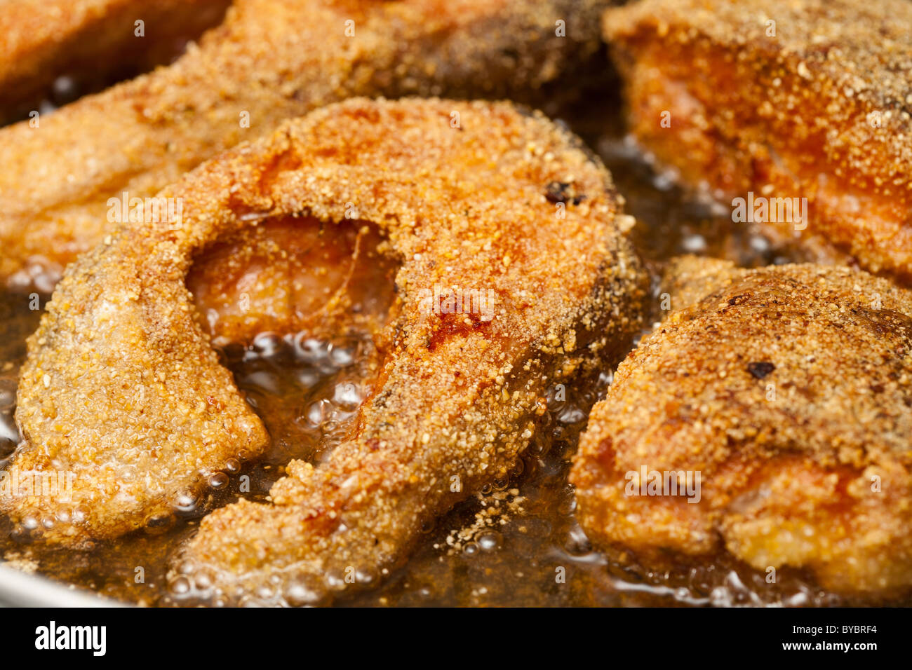 Delicious salmon fillets roasted in the frying pan Stock Photo - Alamy