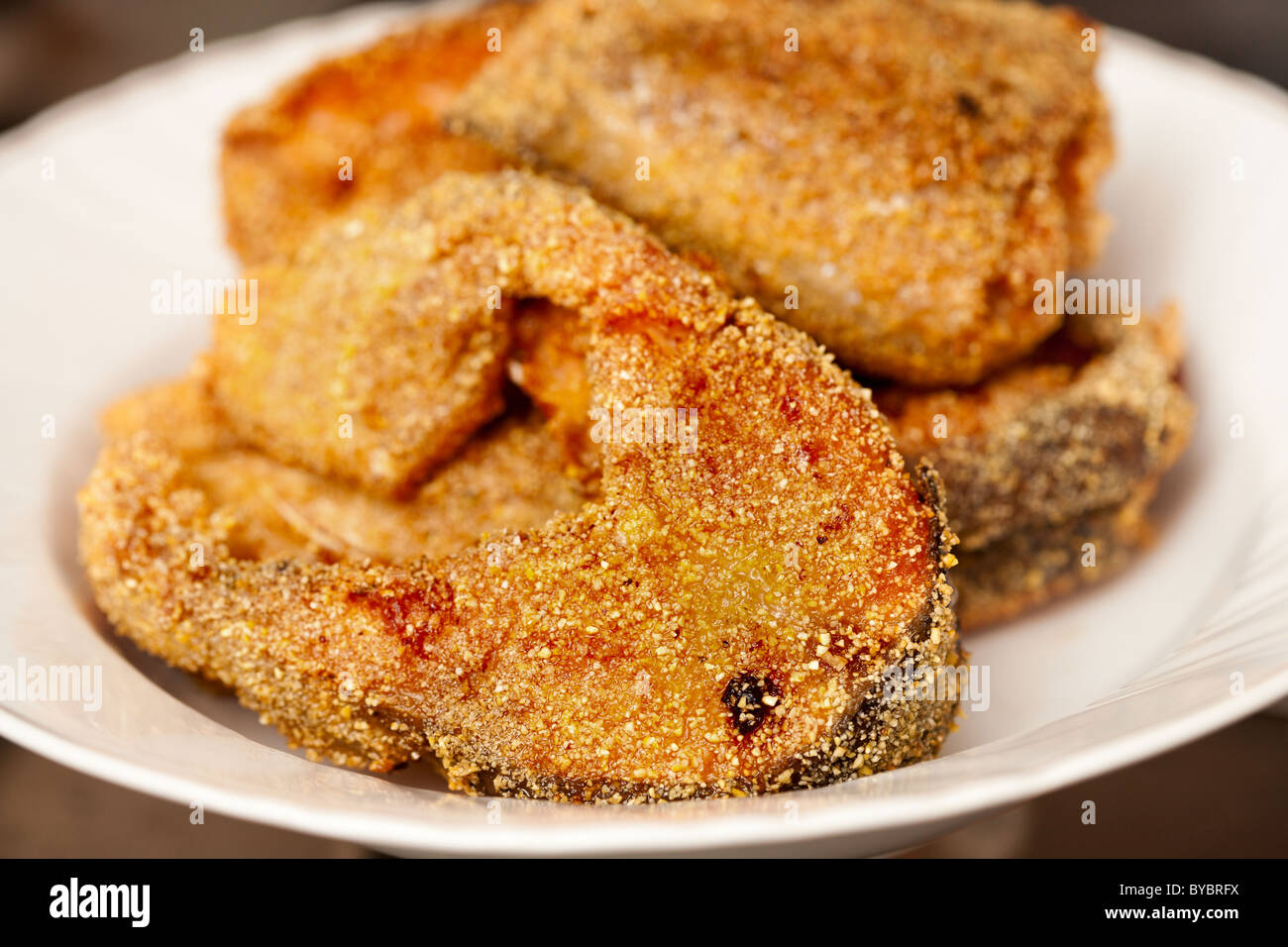 Delicious salmon fillets roasted in the frying pan Stock Photo