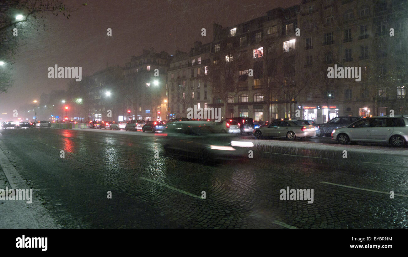 Avenue de la Grande Armée during downpour of sleet Paris France Stock Photo