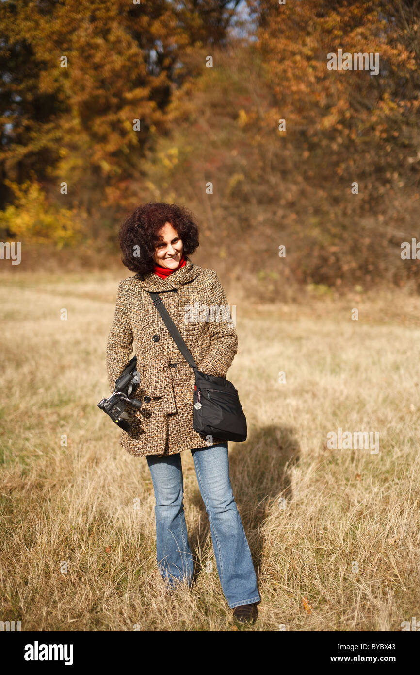 Portrait of a young woman outdoor in the forest Stock Photo - Alamy