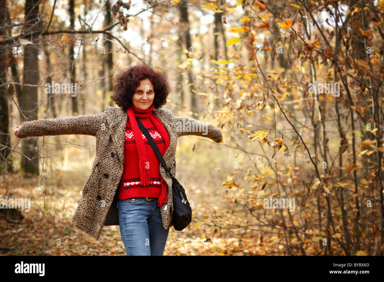 Portrait of a young woman outdoor in the forest Stock Photo - Alamy