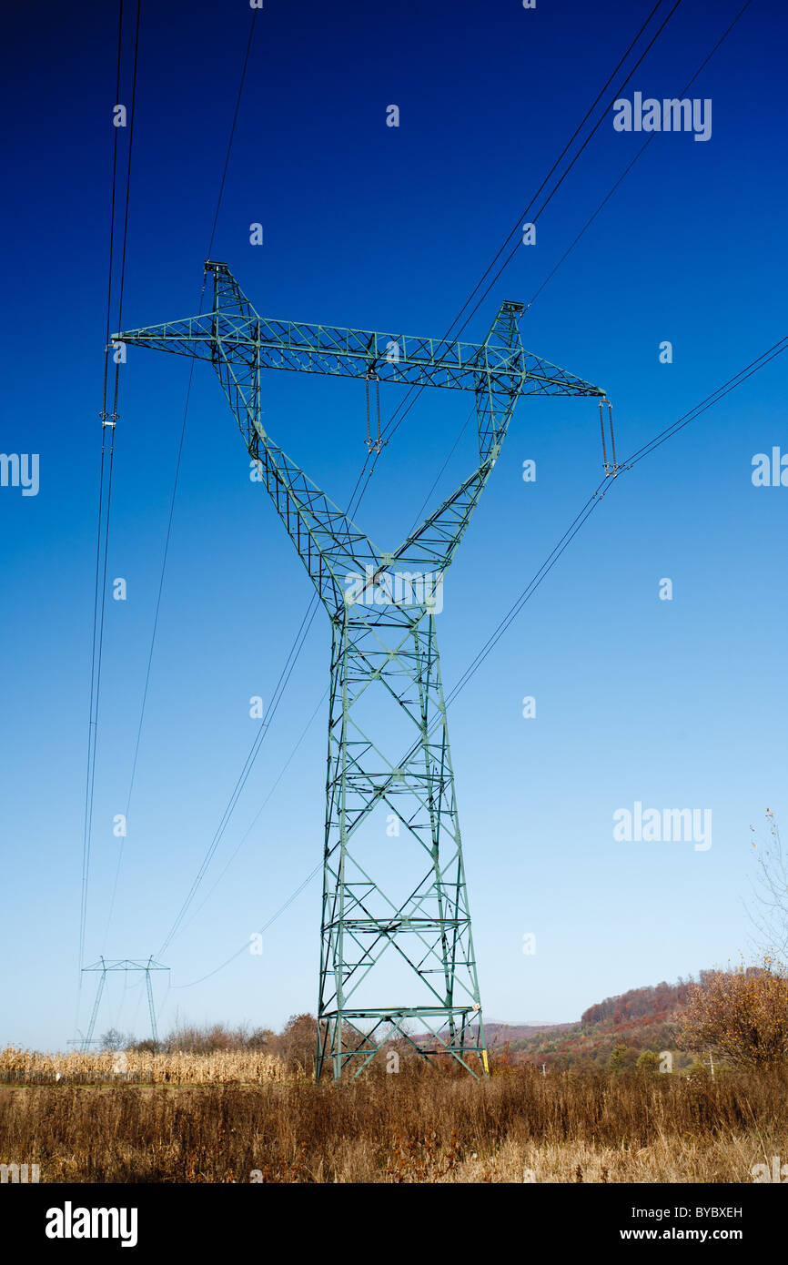 Power line pole against the clear blue sky Stock Photo - Alamy